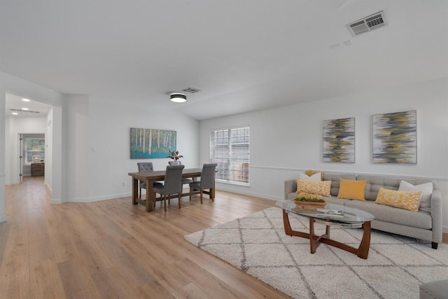 living room featuring light wood-type flooring