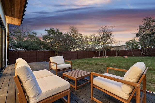 deck at dusk with a yard