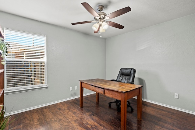 office area with dark hardwood / wood-style floors and ceiling fan