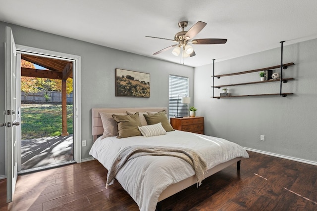 bedroom with access to outside, ceiling fan, and dark wood-type flooring