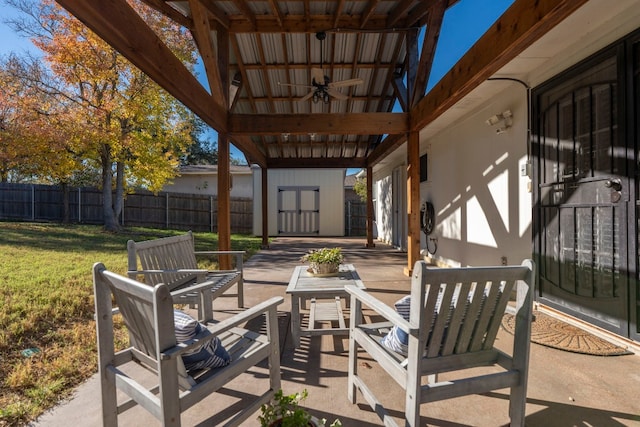 view of patio / terrace featuring ceiling fan