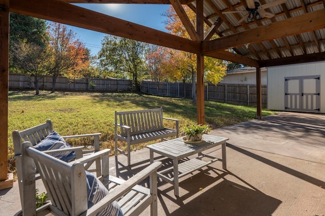 view of patio / terrace featuring a gazebo and ceiling fan