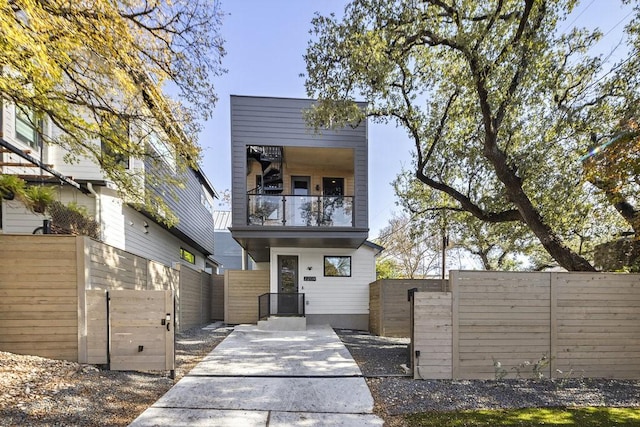 contemporary house with a balcony