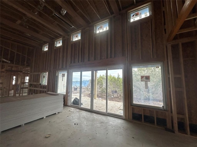 miscellaneous room featuring a high ceiling