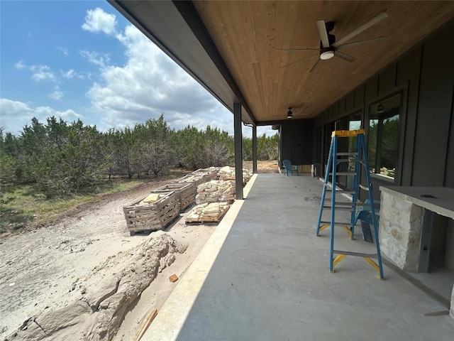 view of patio / terrace featuring ceiling fan