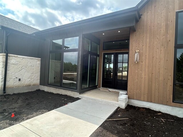 doorway to property with french doors