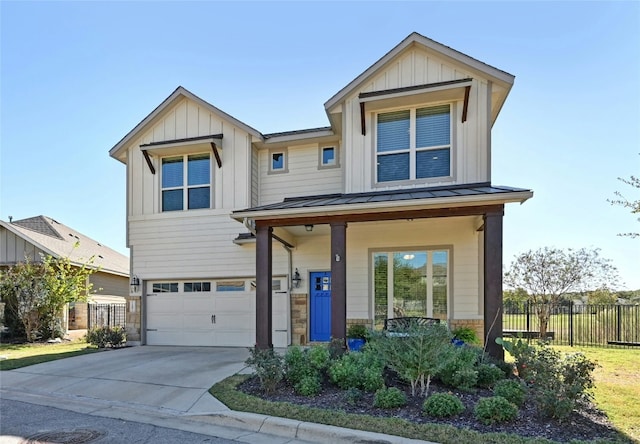 craftsman-style home featuring covered porch and a garage