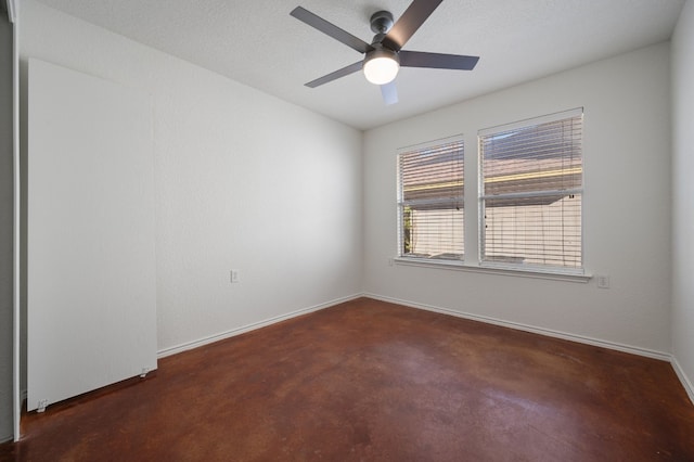 spare room featuring ceiling fan