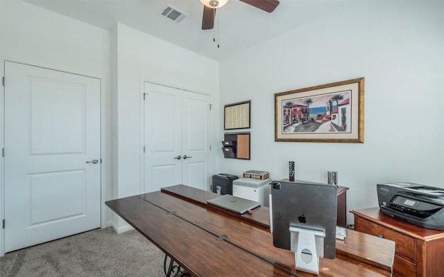 office area with light carpet and ceiling fan