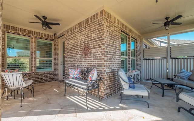 view of patio / terrace featuring ceiling fan