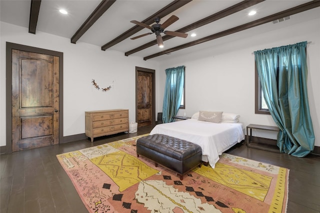 bedroom featuring beamed ceiling, ceiling fan, and dark wood-type flooring