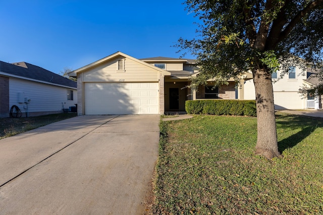 view of front facade featuring a garage and a front lawn