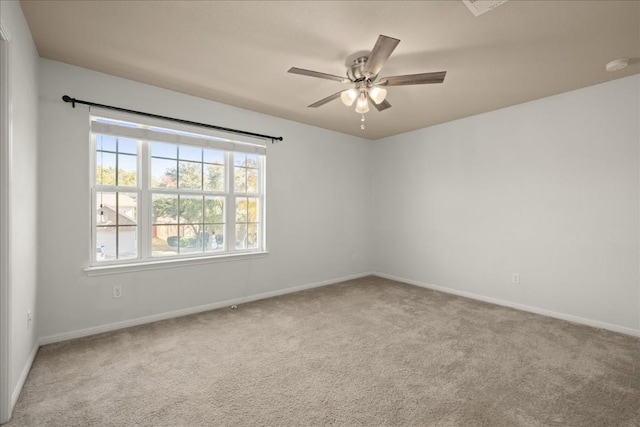 245 Clear Springs Holw, Buda, TX 78610 - carpeted spare room featuring a ceiling fan, baseboards, and a smoke detector