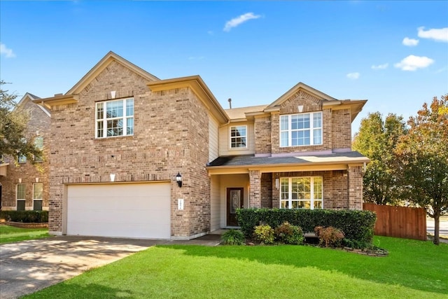 traditional-style house featuring brick siding, concrete driveway, an attached garage, a front yard, and fence