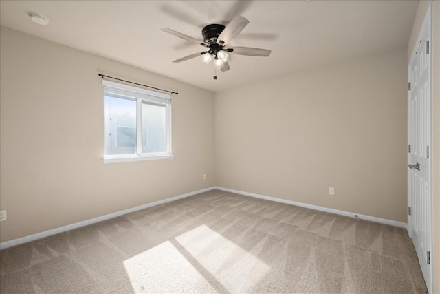245 Clear Springs Holw, Buda, TX 78610 - unfurnished room featuring light colored carpet, ceiling fan, a smoke detector, and baseboards