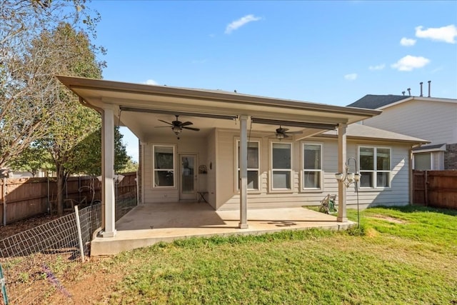245 Clear Springs Holw, Buda, TX 78610 - back of house with a ceiling fan and a patio