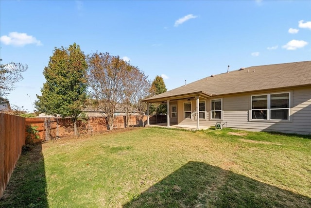 view of yard featuring a fenced backyard and a patio