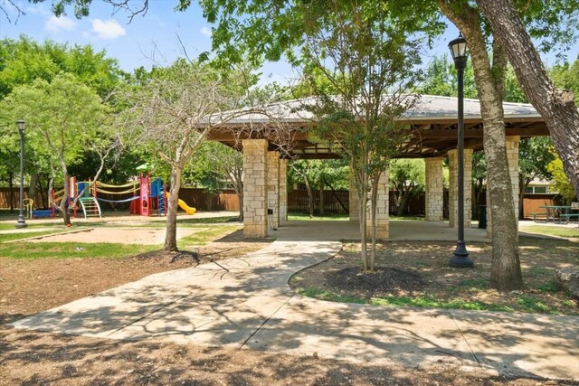 view of community featuring a gazebo and a playground