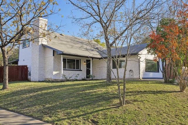 view of front of property with a front lawn