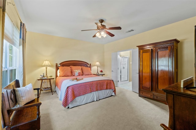 carpeted bedroom with ceiling fan