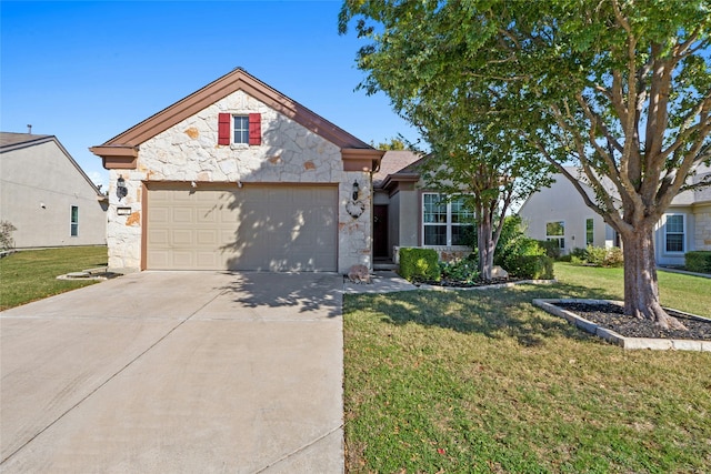 view of front of house featuring a garage and a front yard