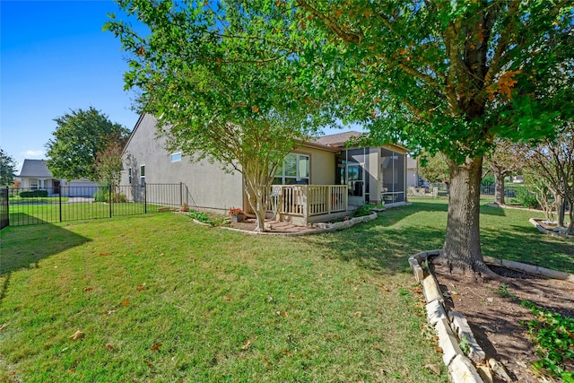 view of yard featuring a sunroom