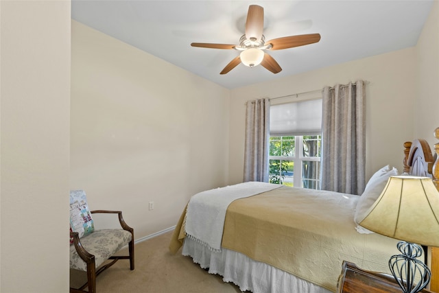 bedroom with ceiling fan and carpet flooring