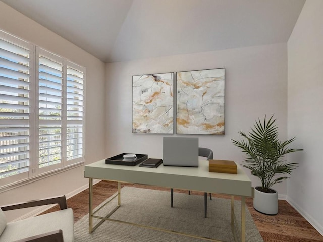 home office with wood-type flooring and vaulted ceiling