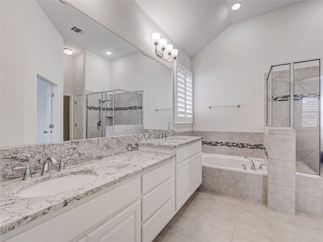 bathroom with plus walk in shower, vanity, tile patterned flooring, and vaulted ceiling