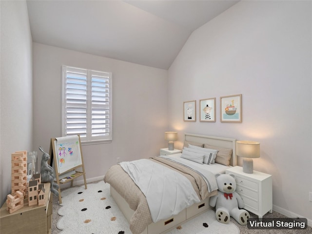 bedroom featuring carpet floors and vaulted ceiling