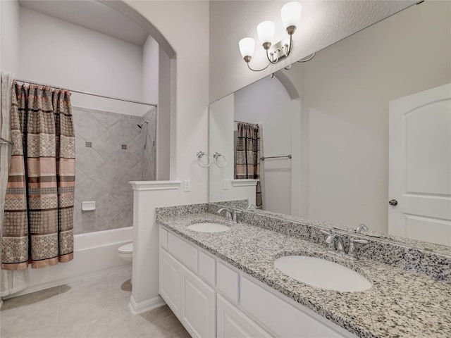 full bathroom featuring tile patterned flooring, shower / bath combination with curtain, toilet, and vanity