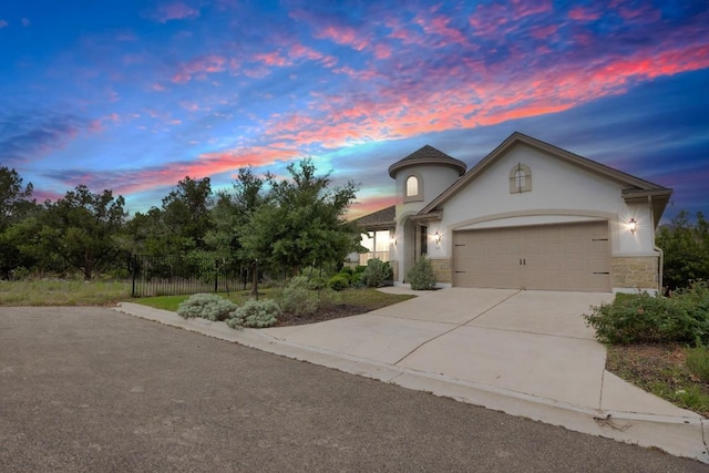 view of front of property featuring a garage