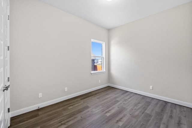 empty room featuring hardwood / wood-style flooring