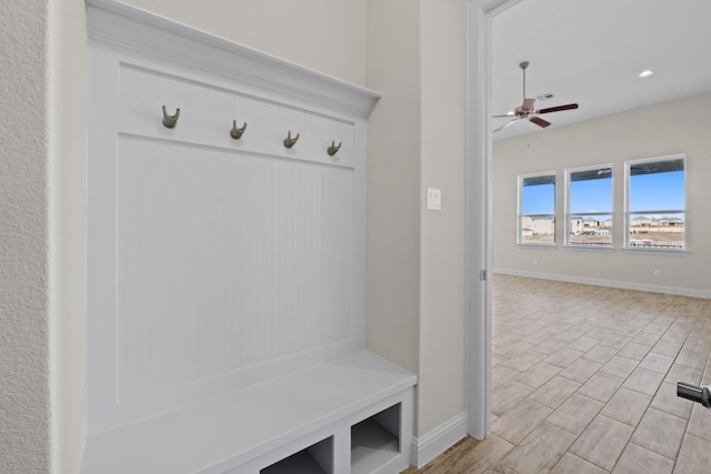 mudroom with light wood-type flooring and ceiling fan