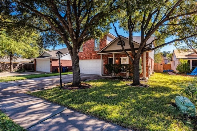 view of front facade with a garage and a front yard