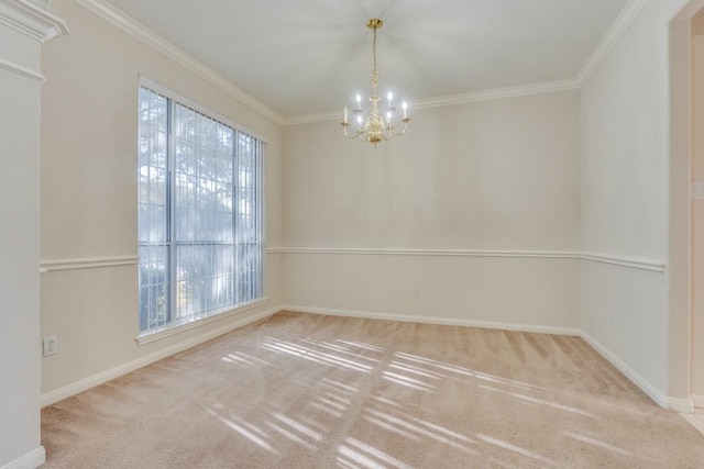 carpeted spare room featuring crown molding and a notable chandelier