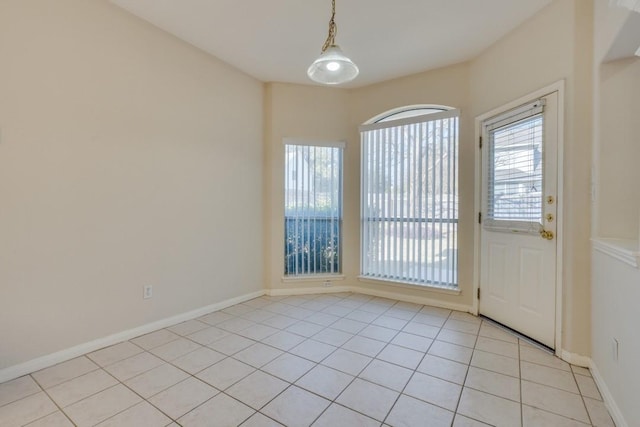 interior space with light tile patterned floors