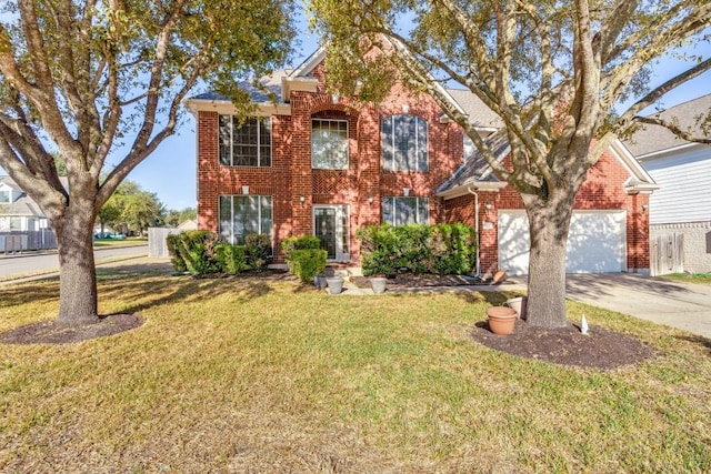 712 Runners Rdg, Pflugerville, TX 78660 - view of front of home featuring brick siding, a garage, concrete driveway, and a front lawn