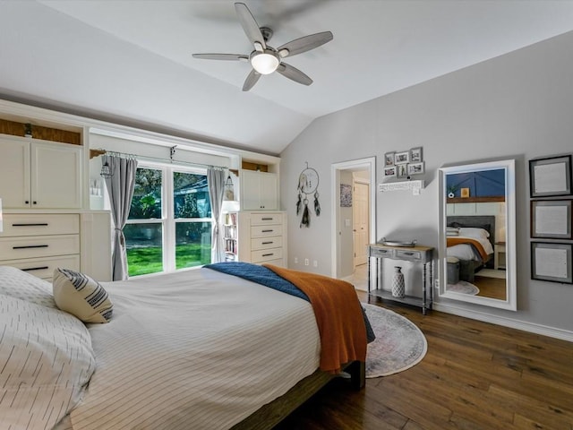 bedroom featuring ceiling fan, dark hardwood / wood-style floors, and lofted ceiling