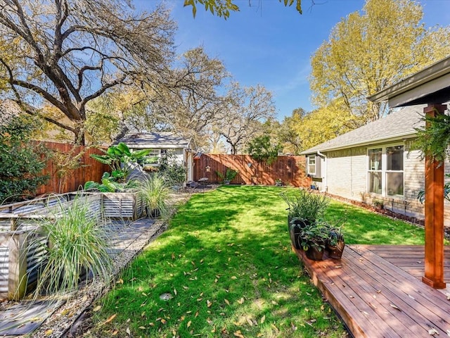 view of yard featuring a deck