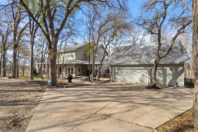 view of front of house featuring driveway and an attached garage