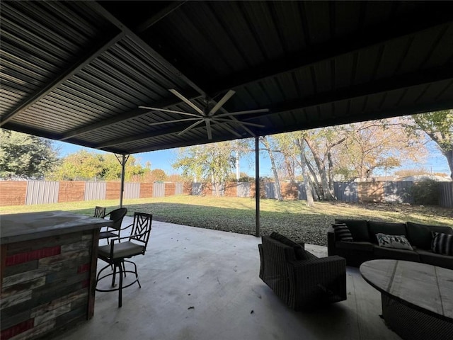 view of patio featuring exterior bar