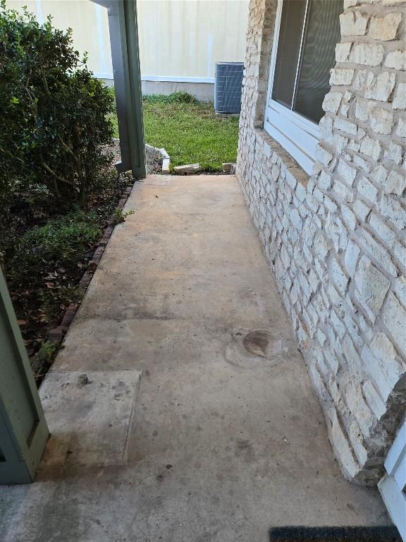 view of patio / terrace featuring cooling unit