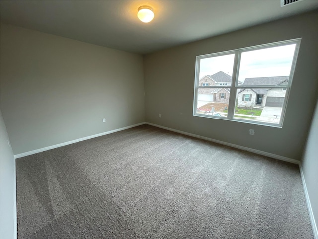 view of carpeted spare room