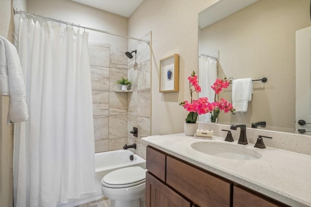 full bathroom featuring shower / bathtub combination with curtain, vanity, and toilet