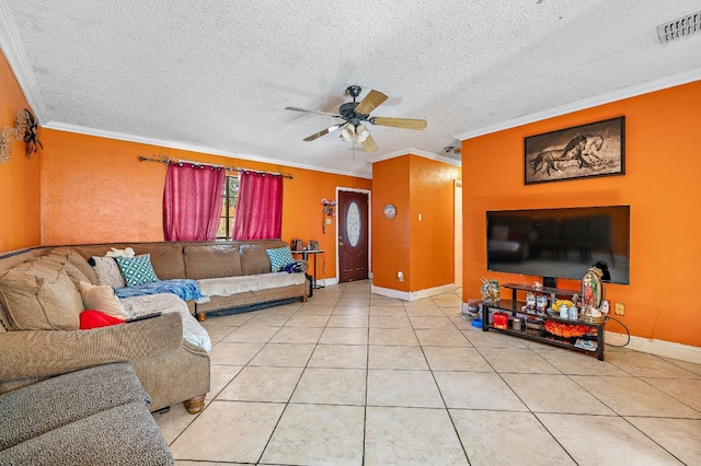 living room with crown molding, tile patterned flooring, ceiling fan, and a textured ceiling