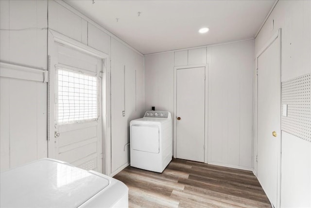 washroom featuring washer / dryer and hardwood / wood-style floors