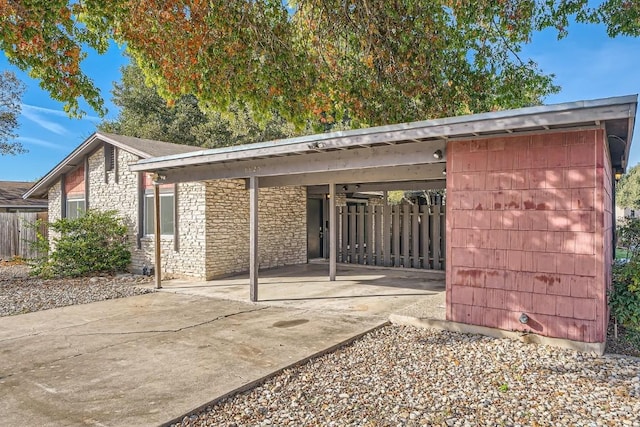 rear view of house with a carport