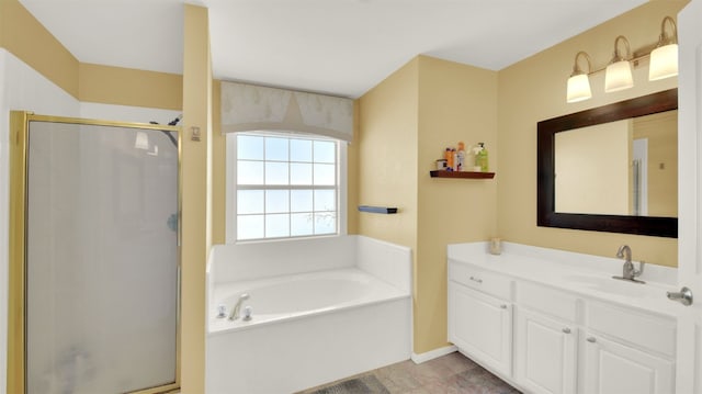 bathroom with separate shower and tub and vanity