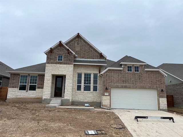 view of front of property with a garage